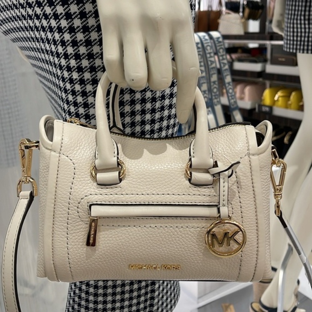 Michael Kors Carine Extra-Small Pebbled Leather Satchel Crossbody 
Light Cream